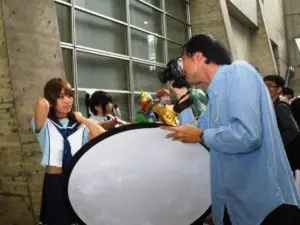 Photographer capturing cosplayers in costume at an event, showing the excitement of cosplay culture. Photo by Tia Haygood.