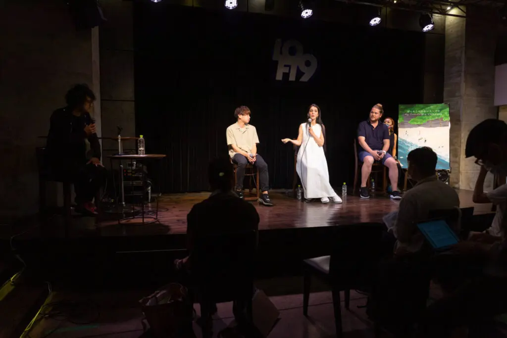 People on the stage talking with the audience at the Symposium for My Invincible Compass Movie - Tokyo Portrait Photographer
