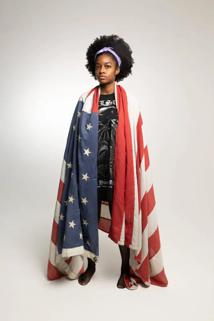 A black young teenage model in a unique outfit covered with a country's flag - Tokyo Portrait Photographer, Headshot photos