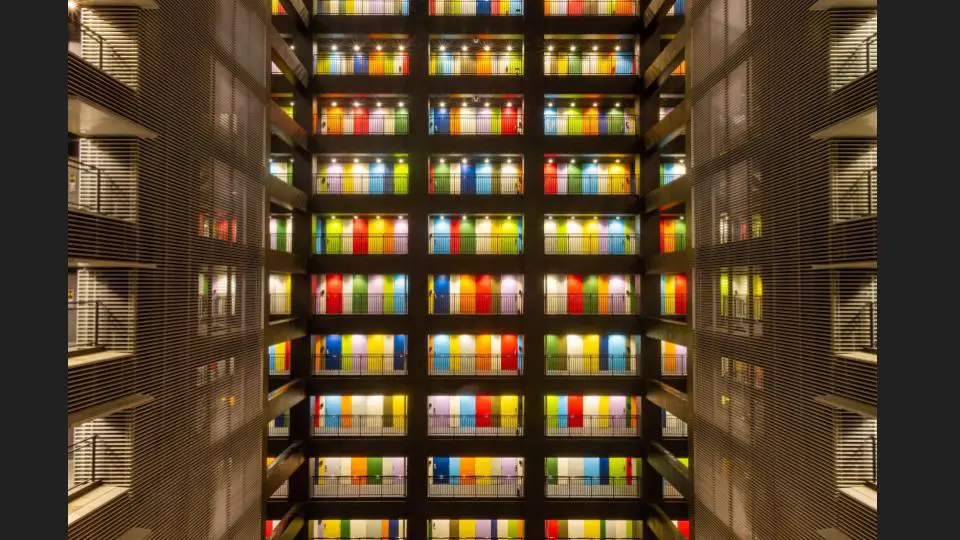 A far-away long shot of the famous rental office building in Japan with so many colorful doors - Tokyo Portrait Photographer