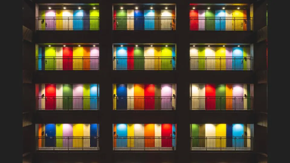 A wide-angle shot of the famous rental office building in Japan, known for its colorful doors - Tokyo Portrait Photographer
