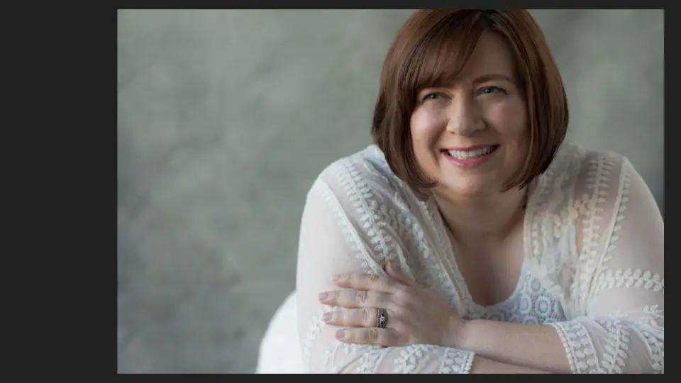 Headshot of a beautiful woman in a white over sized top, smiling at the camera - Tokyo Portrait Photographer, Headshot photos