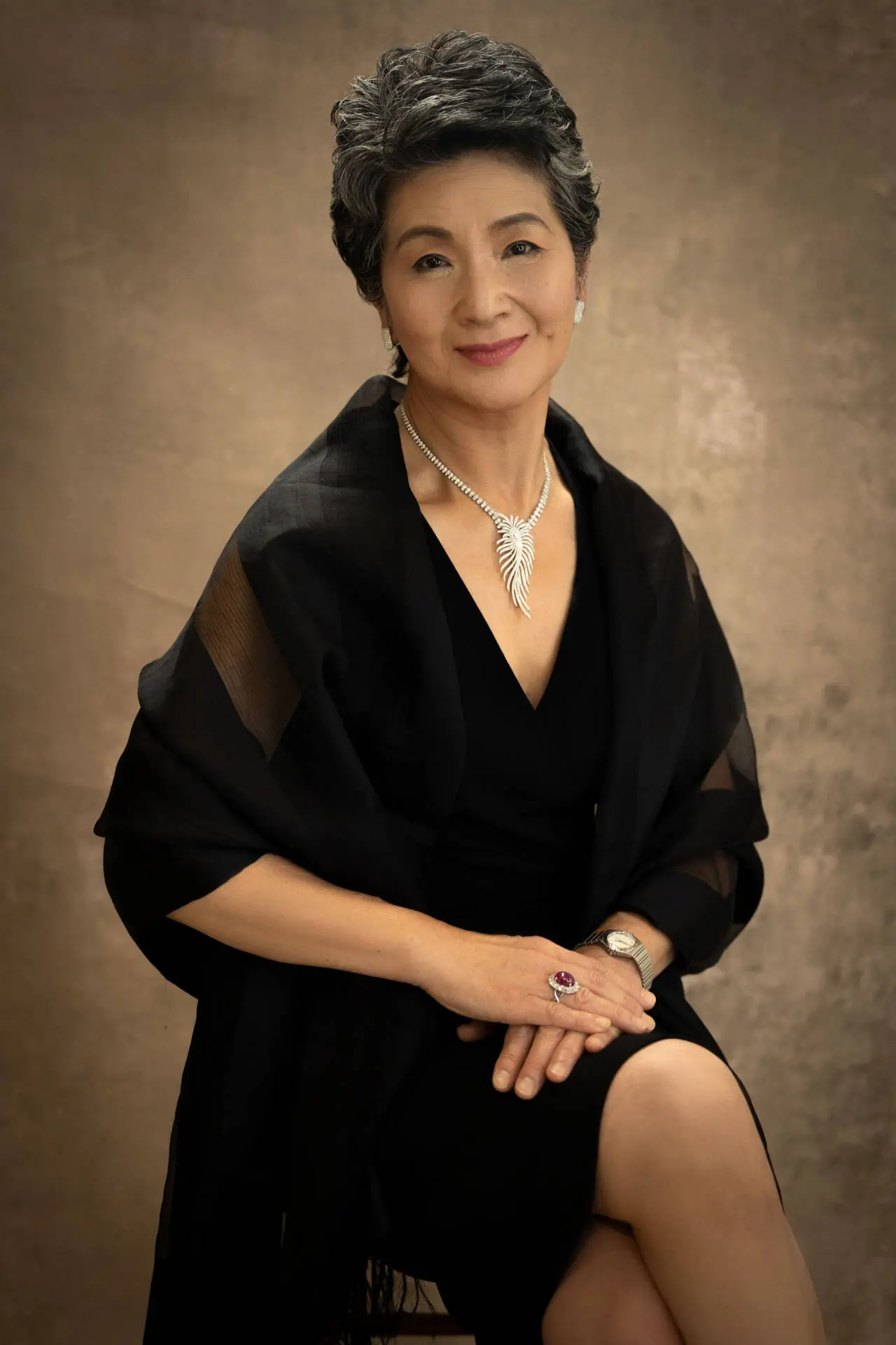 A beautiful indoor headshot of a smiling elderly woman in a fancy black dress - Headshot photos, Tokyo Portrait Photographer, Photographer in Tokyo