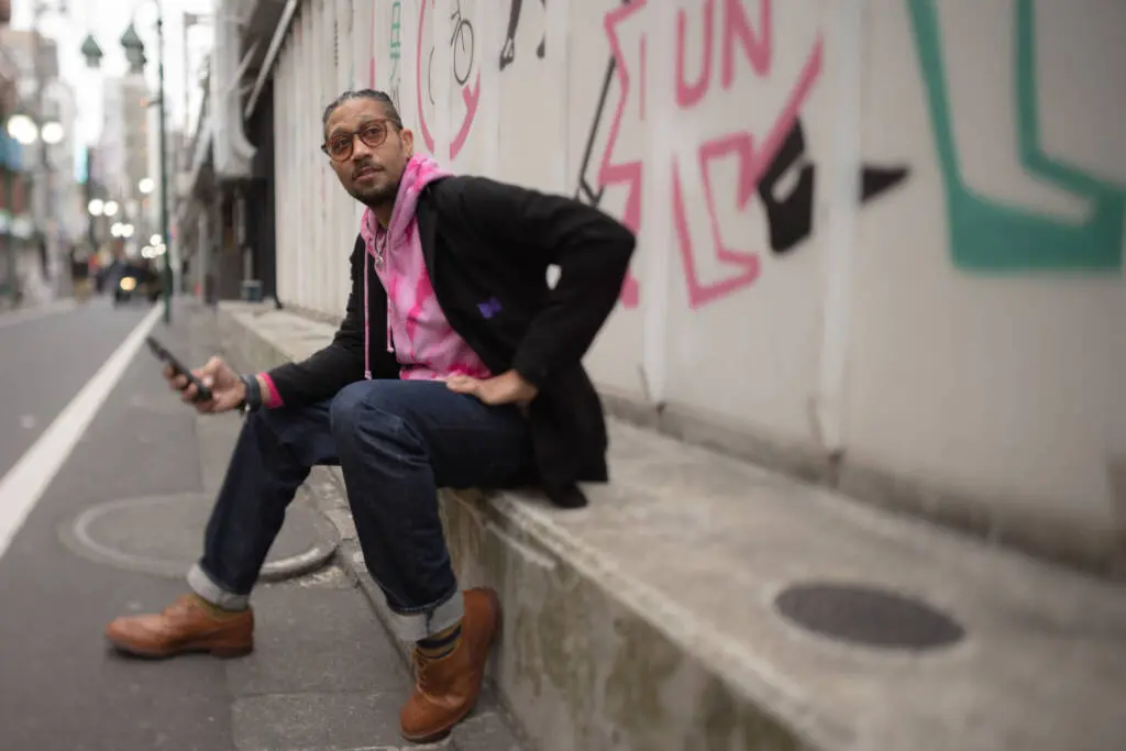 Man in casual dress sitting in a Street for a beautiful portrait shot - Tokyo Portrait Photographer, Photographer in Tokyo