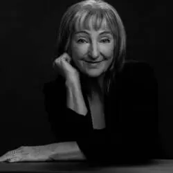 Black and white headshot of a senior citizen woman in corporate attire - Headshot photos, Charlotte portrait photographer