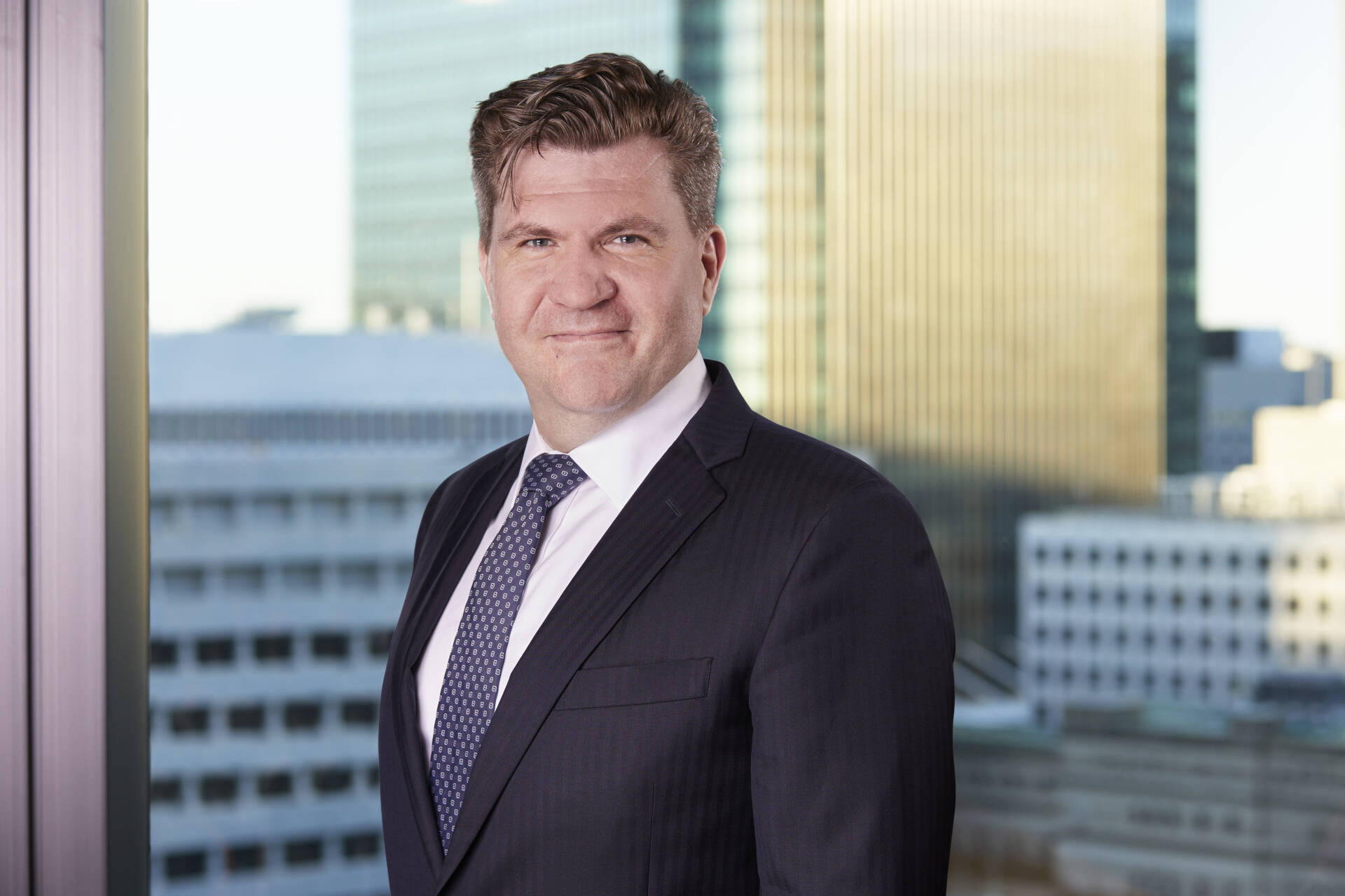 Headshot of a lawyer in his office, in a black suit coat facing the camera - Headshot photos, Tokyo Portrait Photographer