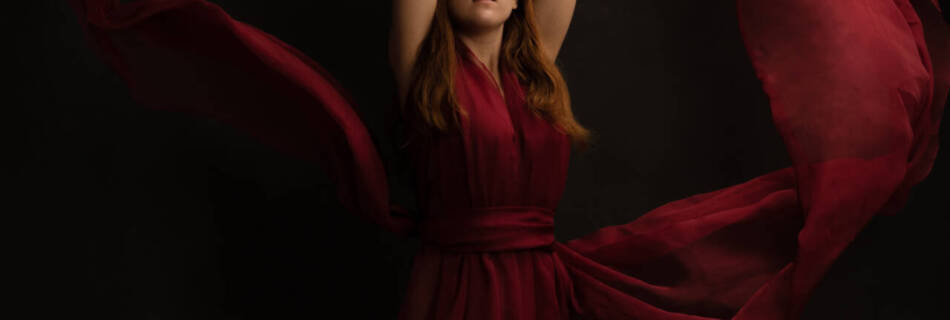 A beautiful headshot of a sexy model posing in a flowing red maxi dress - Model headshot, Modeling in Japan, Headshot photos