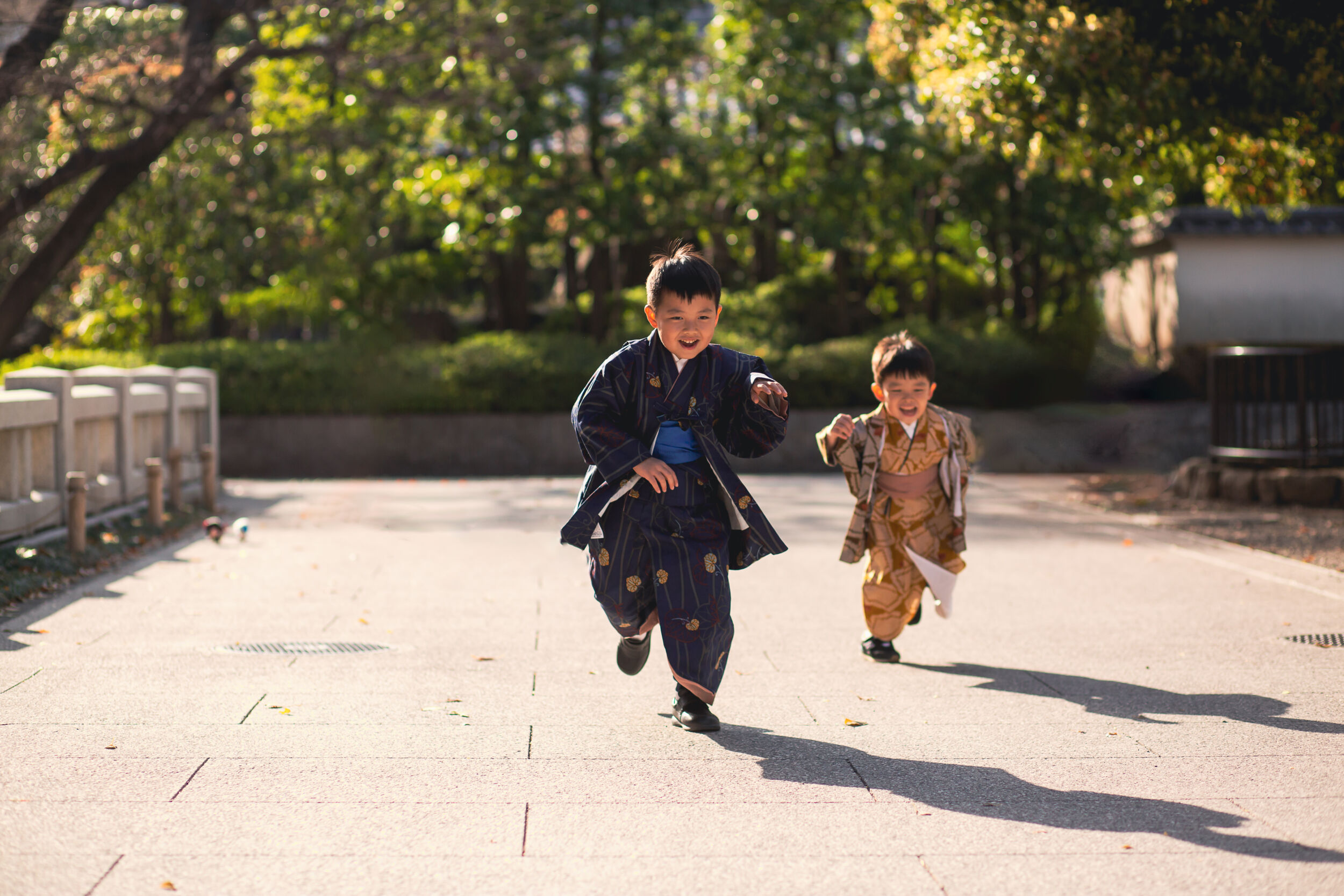 Lifestyle portrait of happy kids playing around at Asakusa Shrine - Family photography, lifestyle photography