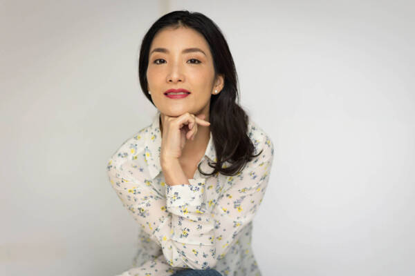 A beautiful young woman in a stylish white shirt facing the camera - Headshot photos, Tokyo & Charlotte portrait photographer