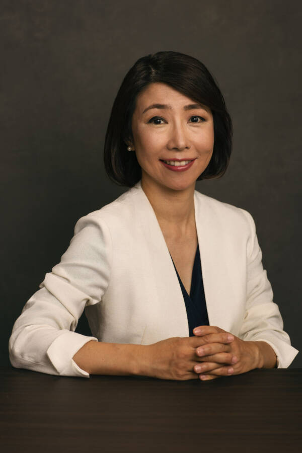 Asian woman wearing a white coat for a corporate setting portrait photography - Tokyo & Charlotte Portrait Photographer