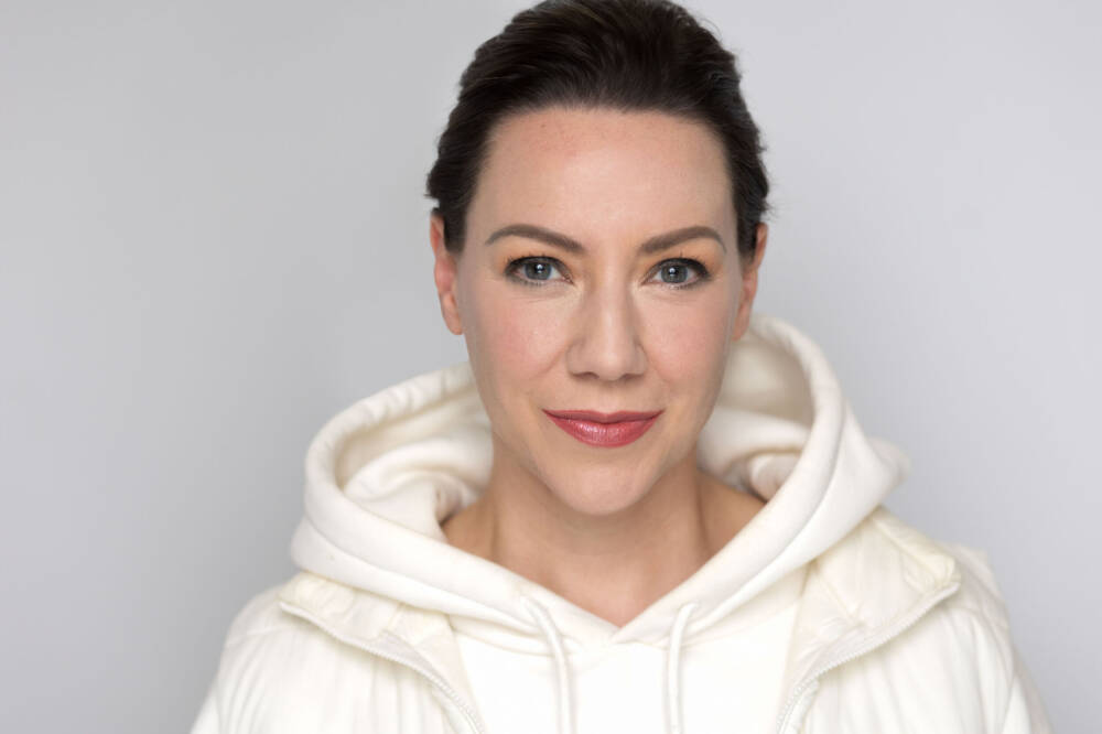 Headshot of a young woman in a white costume, a company branding headshot - Actors Headshot, modeling in Japan