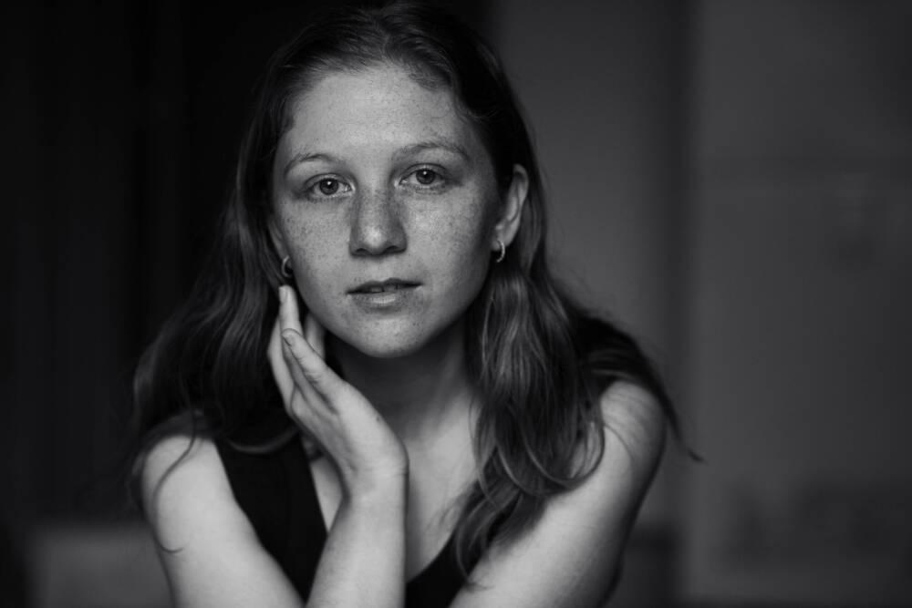 Black and white headshot of young girl in elegant black top facing the camera - Tokyo Portrait Photographer, Headshot photos