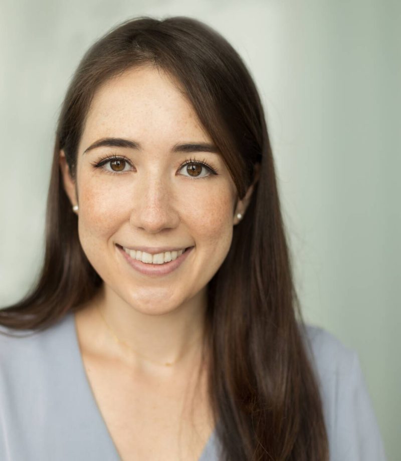 Headshot of a young woman in a grey shirt smiling at the camera - Tokyo Portrait Photographer, Headshot photos